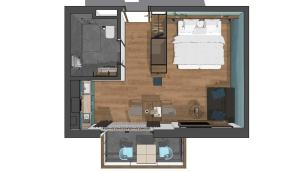 a floor plan of a bedroom and a bathroom at Harabruck Apartments in Gmünd