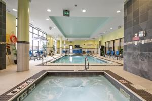 a pool in the lobby of a hospital at Hampton Inn by Hilton Winnipeg in Winnipeg