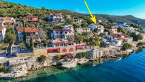 an aerial view of a town on the water at Apartments Rusulica in Vinišće