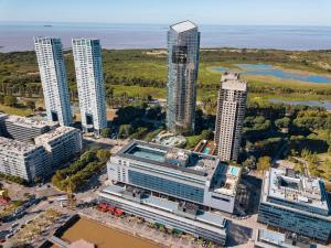 an aerial view of a city with tall buildings at Hilton Buenos Aires in Buenos Aires