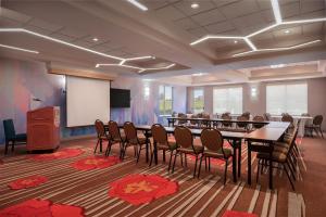 a meeting room with a long table and chairs at Hilton Garden Inn Wooster in Wooster +27 photos