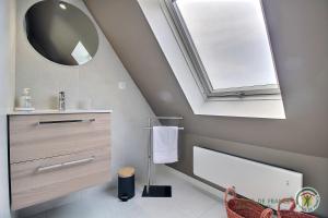 a bathroom with a sink and a mirror at Kerguntuil in Pleumeur-Bodou +74 photos