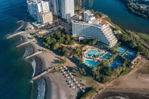 an aerial view of a resort and the ocean at Hilton Cartagena in Cartagena de Indias