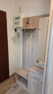 a dressing room with a mirror and a dresser at Apartmán Mírová 472 B in Milovice