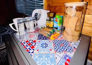 a counter top with some food and a blender at Lake Cabin in Olifantshoek