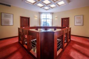 a room with a wine cellar with wooden cabinets at Hotel Villa in Prague +25 photos