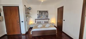 DG Apartment Busto 객실 침대