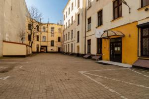 an empty street in a city with buildings at Hostel H360 - dawniej Hotelik Relax in Łódź