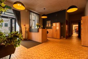 a large room with a lobby with a lobby at Hostel H360 - dawniej Hotelik Relax in Łódź