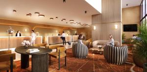 a lobby of a hotel with people in a waiting room at Le Méridien Paris Arc De Triomphe in Paris