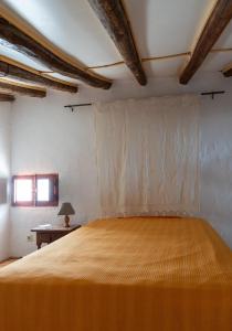 a bedroom with a large bed in a room at Finca Antas Villa in Antas +19 photos