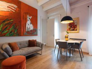 a living room with a couch and a table at LEONI DI COLLALTO PALACE in Treviso +118 photos