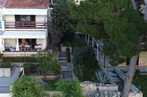 an aerial view of a house with a yard at Apartment Mladinić in Okrug Donji