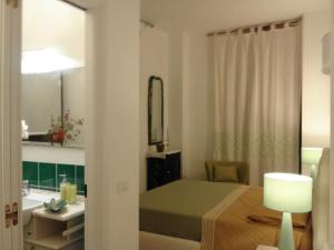 Koupelna v ubytování B&B Il Porticciolo Portoscuso + 35 fotografií