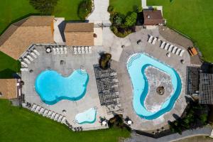 an aerial view of a swimming pool at HTR Niagara in Grand Island +11 photos