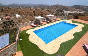 an overhead view of a swimming pool on a house at Villa La Colina in Torrox