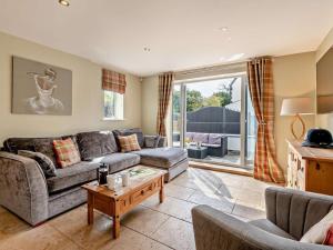 a living room with a couch and a table at 2 Bed in Middlesbrough oc-75226 in Great Ayton