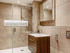 a bathroom with a shower and a sink and a shower at 5 Bed in Leeds oc-91355 in Sherburn in Elmet +31 photos