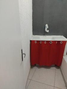 a red sink in a bathroom with a mirror at Estalagem Triplex Vermelho in Vitória +32 photos