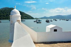 a view of a harbor with boats in the water at Pousada Allmar in Bertioga