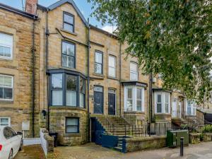 an old brick house with a car parked in front of it at 4 Bed in Harrogate oc-hh025 in Harrogate