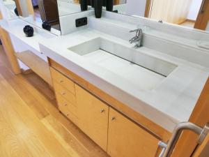 a white sink in a bathroom with a mirror at VILLA MON REPOS CON PISCINA Y A/A in Colera +38 photos