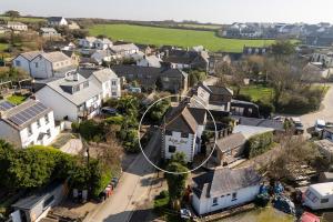 an aerial view of a residential neighborhood with houses at Cosy Nook at Jam Jar Kitchen in Crantock