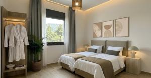 a bedroom with a large bed and a window at 360 Skyline Suite, Argostoli in Argostoli