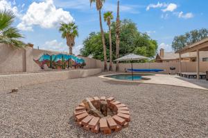a playground with a pool and a painting on a wall at Private Pool & Fire Pit: Tucson Home Near Hiking! in Tortolita