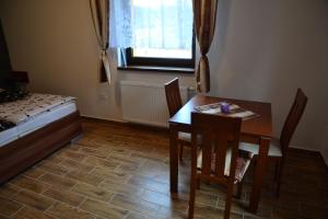 Posteľ alebo postele v izbe v ubytovaní Apartmány Nad řekou