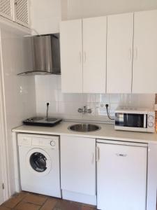 Kuchyň nebo kuchyňský kout v ubytování Apartamentos Gadi Corral Siglo XVI