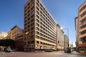 a tall building on the corner of a city street at The Haas, Trademark Collection by Wyndham in Los Angeles