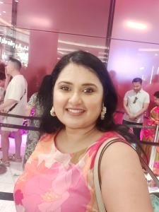 a woman standing in front of a store at Comfort Zone in Chennai