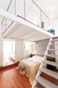 Postel nebo postele na pokoji v ubytování Fantastic Penthouse Malaga Center