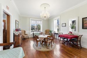 a dining room with a table and chairs at Heber Senator Bed and Breakfast in Heber City