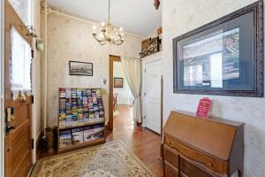 a room with a large display case in a room at Heber Senator Bed and Breakfast in Heber City