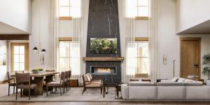 a living room with a couch and a fireplace at Tributer Resort in Mineral