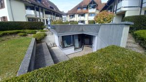 an external view of a building with a house at Seeloge mit Dachterrasse direkt am Westhafen in Hagnau am Bodensee in Hagnau