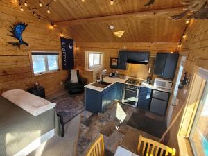 an overhead view of a kitchen in a log cabin at Little Bear Getaway Cabins in Glacier View