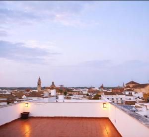 a view of a city from the roof of a building at ático con terraza- solarium in Écija