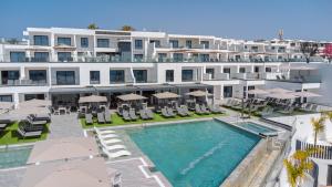 an aerial view of a hotel with a swimming pool at Hotel Royal Atlántico in Puerto del Carmen +47 photos