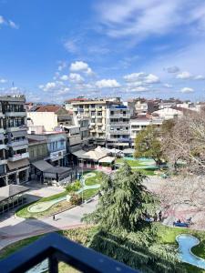 a view from a balcony of a city with buildings at Nest Studio in Katerini