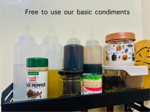 a shelf filled with lots of different types of condiments at Dysha's Home in Davao City