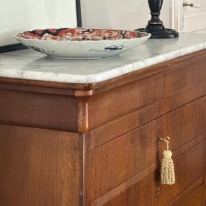 a bowl on top of a wooden dresser at Demeure Bouquet in Ambierle +38 photos