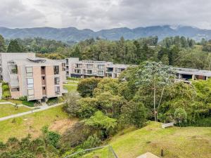an overhead view of an apartment complex in a city at Upscale 2BR Countryside Suite | Stylish & Modern in El Retiro