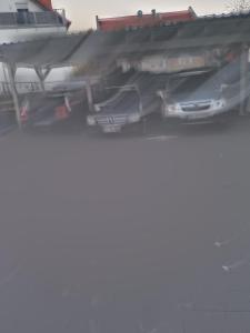 a group of cars parked in a garage at Waldstreet in Rüsselsheim