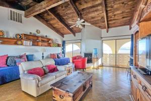a living room with a couch and a table at Spacious Oceanview Home Casa de Los Amigos in Puerto Peñasco