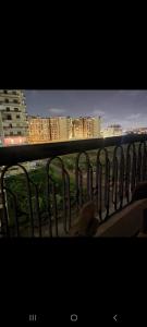 a view of a city skyline from a balcony at one room in Alexandria +9 photos