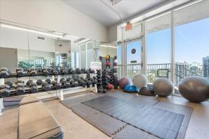 a gym with a lot of exercise equipment in a building at Private Oasis at Arya in Miami