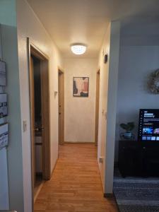 a hallway leading to a room with at RJN in Fairbanks +3 photos
